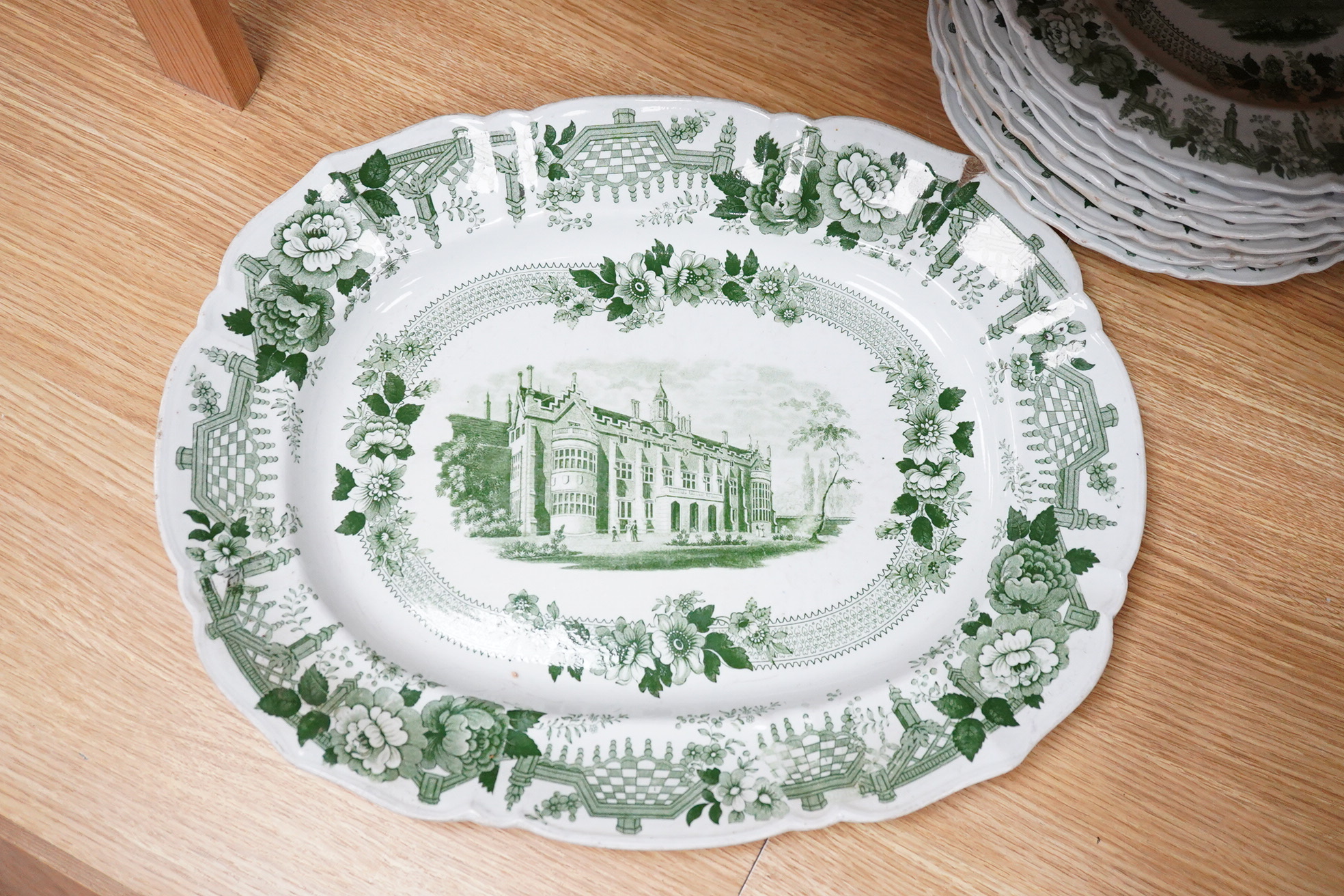 A Mason’s ironstone Cambridge colleges green printed part dinner service, c.1830-40 (11)., Oval plater 43cm wide.